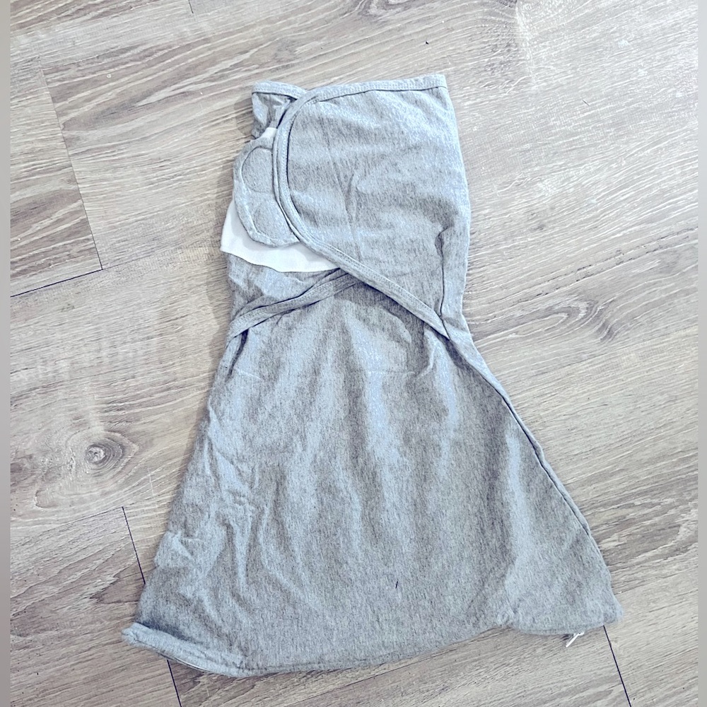 Sleeping Baby swaddle M/L. Never used.